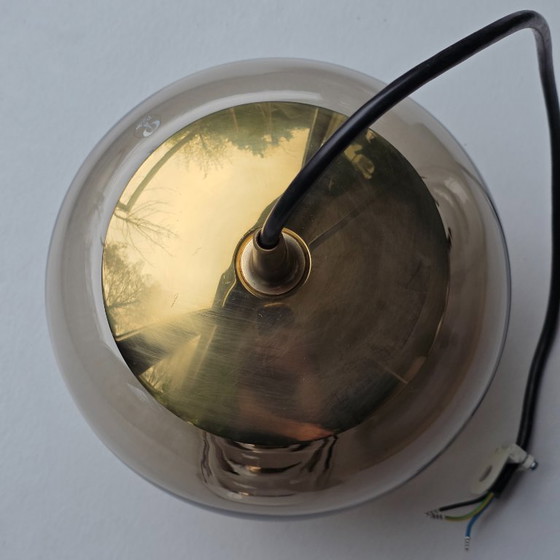 Image 1 of Vintage Space Age pendant lamp – Peill & Putzler “Wave” / “Futura” – 1970s Germany – Smoked glass and metal – Ø 22 cm. Gold.