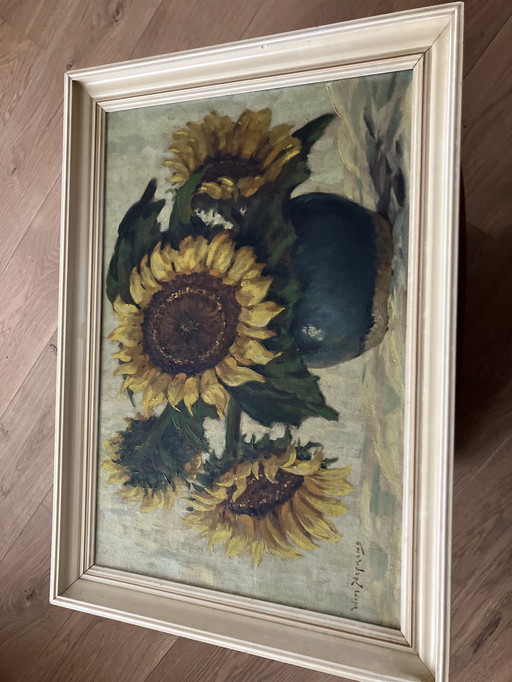 Zonnebloemen in lijst van Wim Nefkens