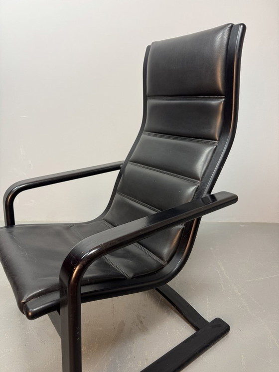Image 1 of Mid-CenturyDesign Black Leather Lamino Lounge Chair on Black Lacquered Plywood Frame by  Yngve Ekstrom. Denmark, 1970s.