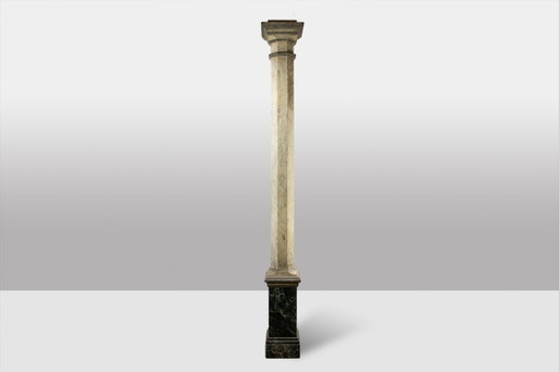 Pair of columns in wood painted to imitate marble. 1880s.