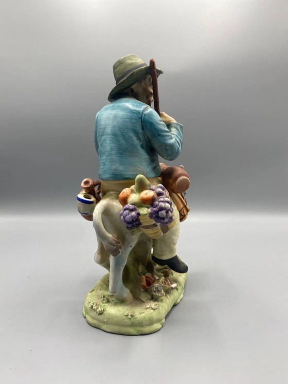 Figurative bisque group, peasant and his donkey loaded with fruit, polychrome, Mediterranean style – Sculpture (photo 3 of 5)