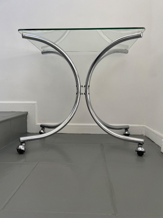 Image 1 of Salontafel van chroom en glas met wielen
