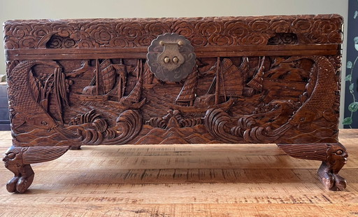 Antique Chinese camphor chest with rich wood carving