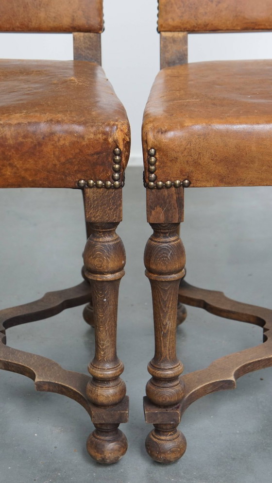 Image 1 of Satz von 2 antiken Esszimmerstühlen aus Holz und Schafsleder aus den frühen 1900er Jahren