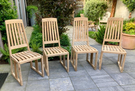 Image 1 of 4 elegante Gloster teakhouten tuinstoelen, zware kwaliteit teak