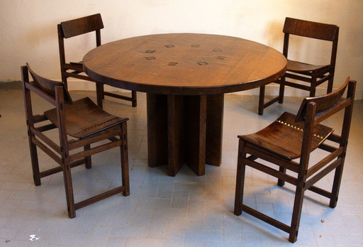 Zeldzame vroege Giuseppe Rivadossi massief eikenhouten eettafel met vier stoelen met diamantvormig snijwerk.