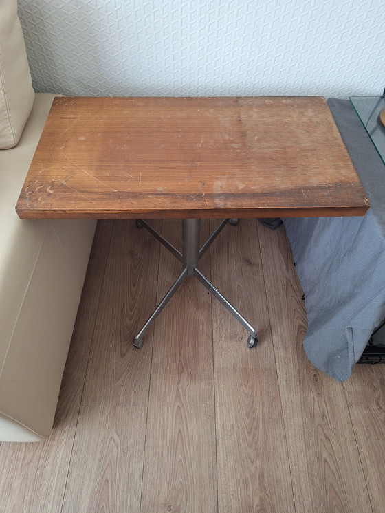 Image 1 of Vintage wooden table on wheels