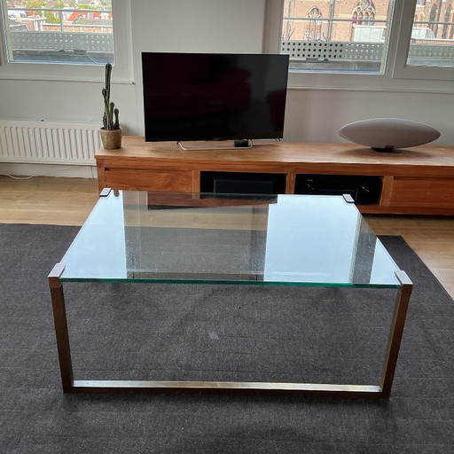 Glass coffee table by Peter Ghyzcy