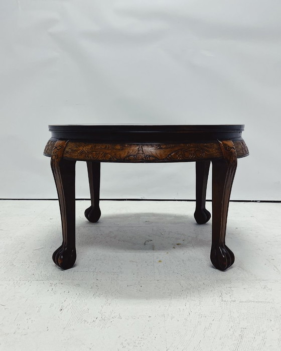 Image 1 of Round Wooden Coffee Table with Asian Carved Top