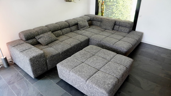 Image 1 of Moderne Grijze Hoekbank met Hocker - Comfortabel en Stijlvol