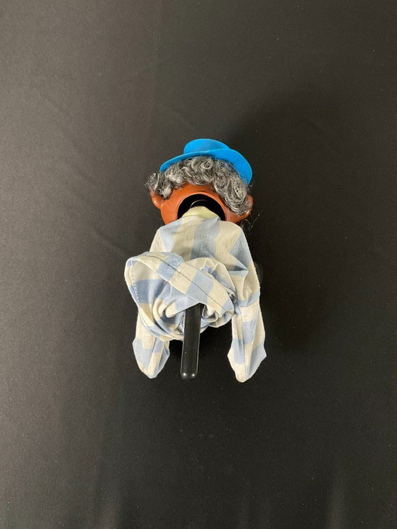 Image 1 of Paar oude bokshandpoppen Aziatische man en clown