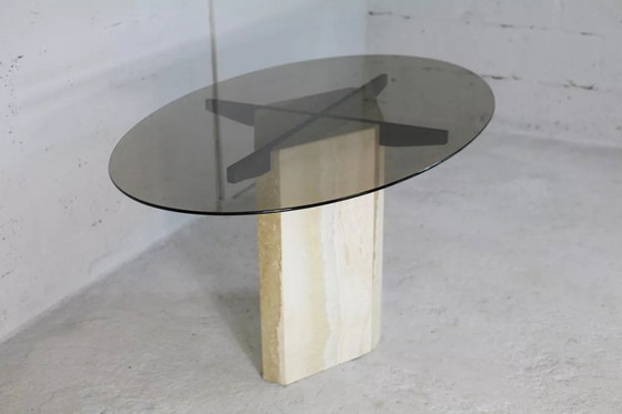 Image 1 of Mesa de salón, base de piedra y tablero elíptico de cristal ahumado