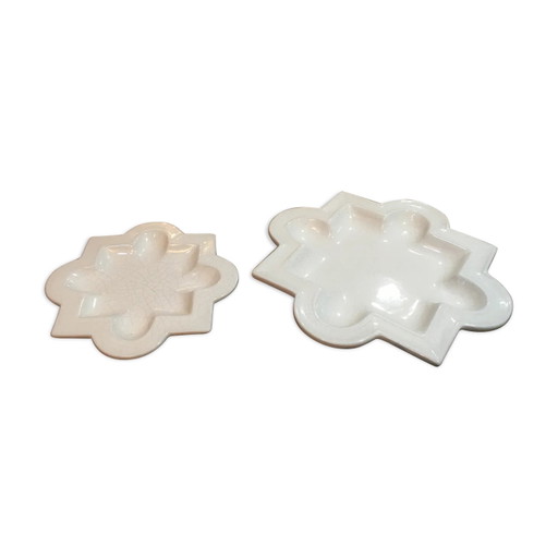 Pair of ceramic pocket vacuum