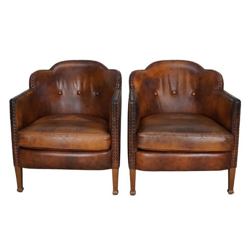 Sillones de club holandeses vintage en cuero color coñac, juego de 2