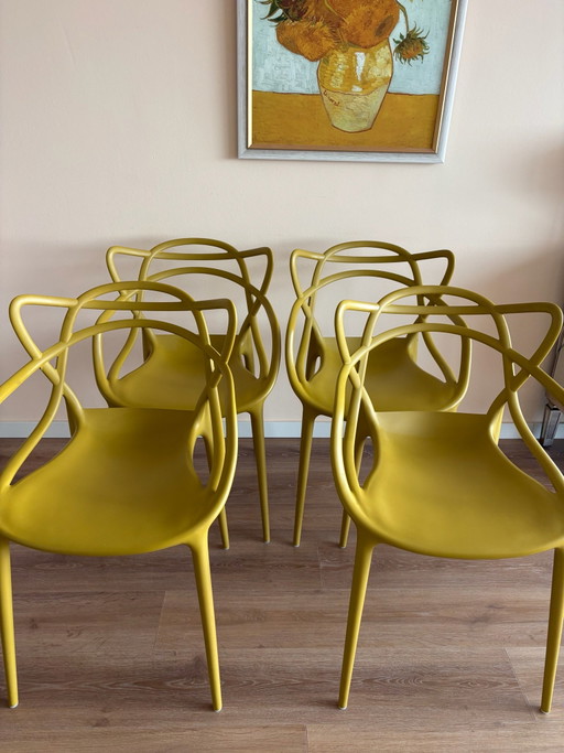 4 chaises design Kartell jaune ocre
