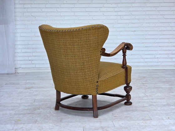 Image 1 of Deense fauteuil uit de jaren 60, originele groene meubelwol, gesneden eikenhout