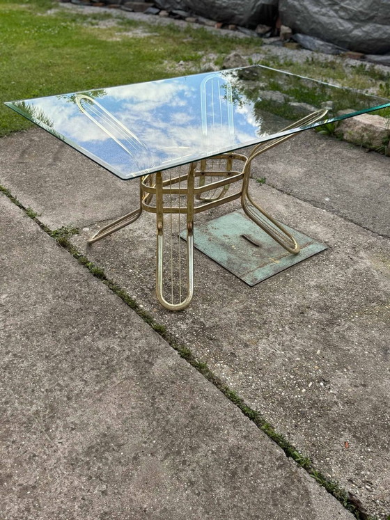 Mesa de comedor de latón y cristal, Italia, años 70 – Mesas de comedor, Vidrio, Hollywood Regency (photo 9 of 9)