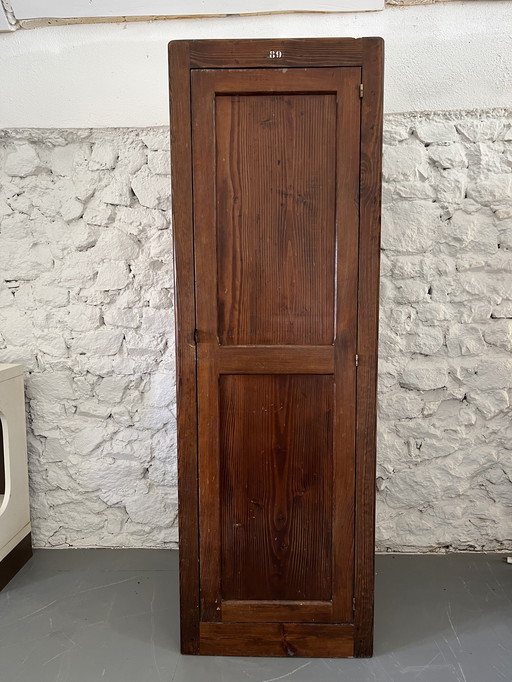 Old wooden school checkroom