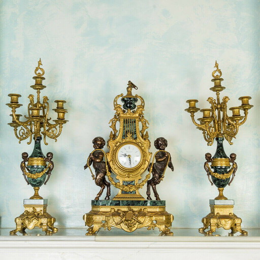 Pair of candelabra and clock in Verde Alpi marble and bronze, 50s