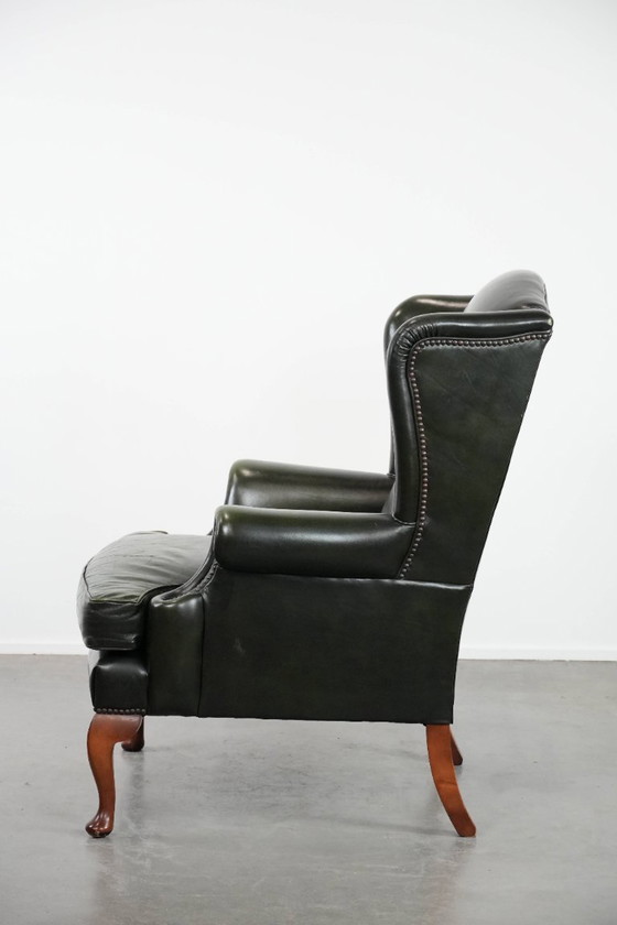 Image 1 of Fauteuil Chesterfield classique en cuir de vachette lisse de couleur vert foncé