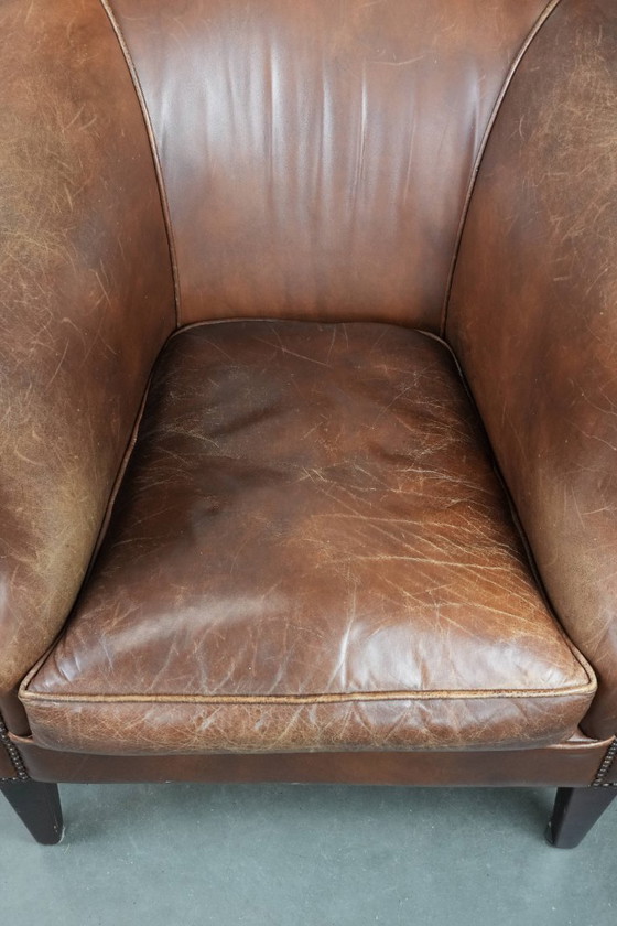 Image 1 of cognac kleurige vintage rundleren clubfauteuil in Engelse stijl 