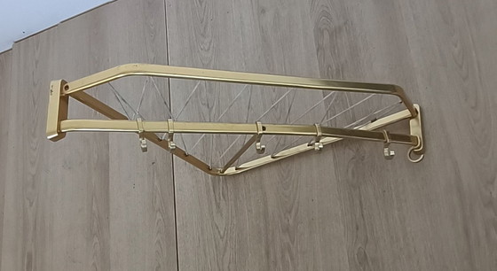 Image 1 of Fifties corner string coat rack