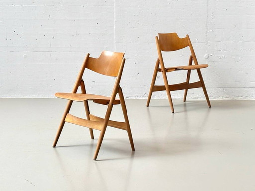 2 sillas plegables SE 119 de Egon Eiermann para Wilde + Spieth