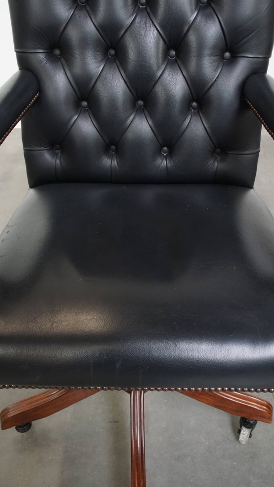 Image 1 of Dark blue/ black cowhide leather chesterfield office chair on wheels