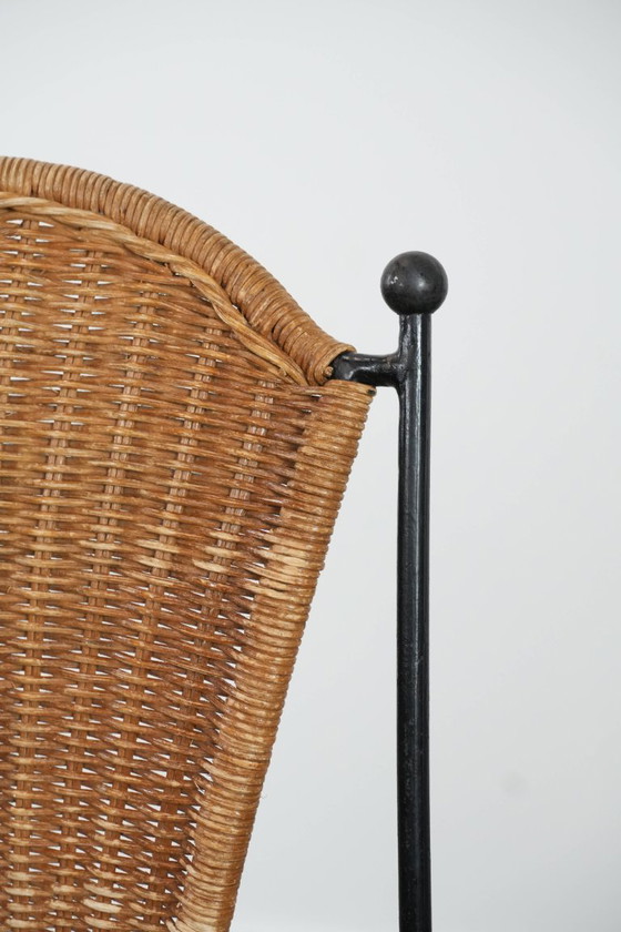 Image 1 of 2x Vintage design eetkamerstoelen van Frederick Weinberg met een gietijzeren frame