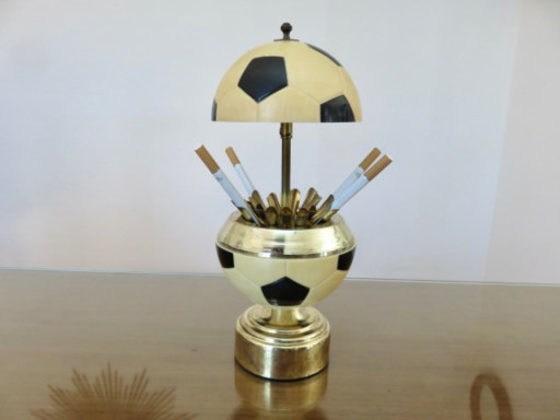 Cigarette dispenser "football" music box, 1960