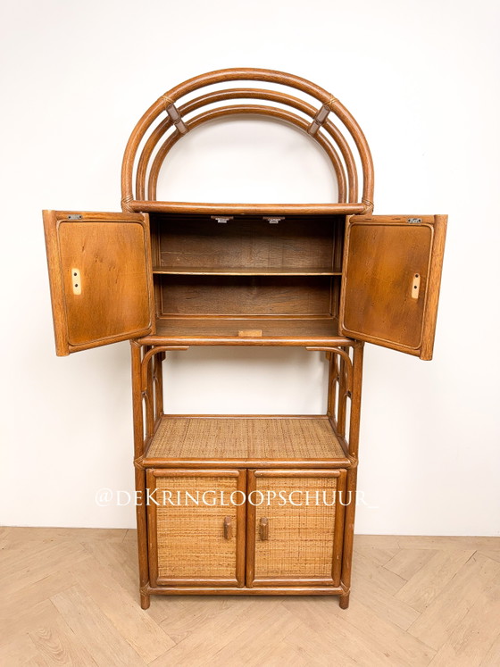 Image 1 of Vintage rattan bamboo manou arched cabinet with doors