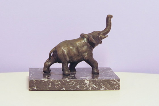 Image 1 of Buchstütze Elefant aus schwarzem Marmor