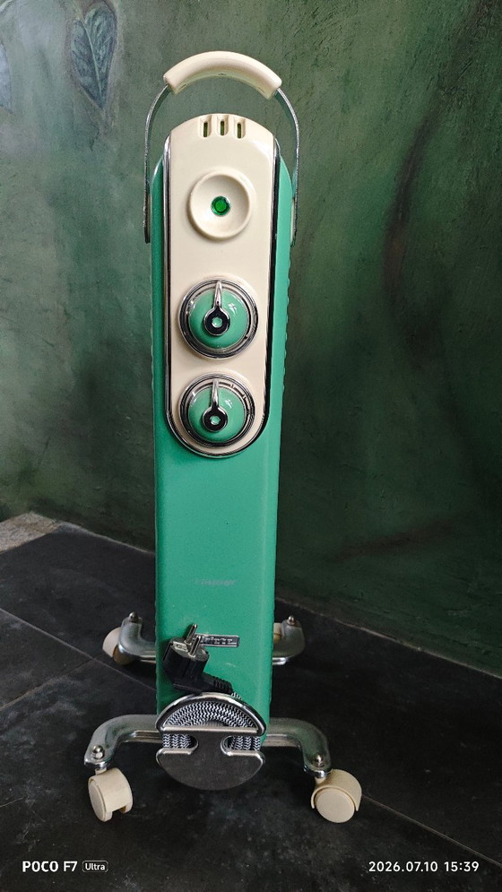 Riscaldatore elettrico vintage a olio – Prodotti per la manutenzione, polished steel (photo 5 of 5)