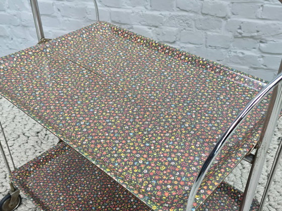 Image 1 of Vintage Foldable and Mobile Chrome Steel 2 Floral Decorated Layers ‘Dinett’ Serving Trolley by Gerlinol, Germany, 1970s. 