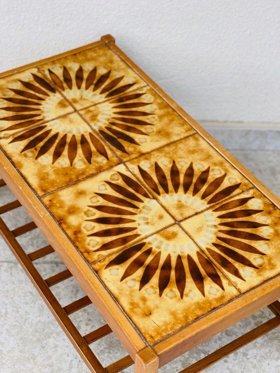 Image 1 of Vintage teak and ceramic coffee table with sun motif, 1960