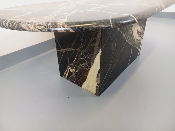 Image 1 of Vintage oval coffee table in black marble from the 1970s