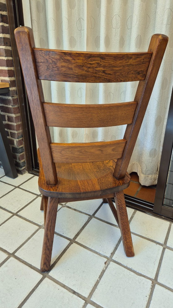 Image 1 of Set van 4 vintage Nederlandse brutalistische massief eikenhouten eetkamerstoelen – Nederlands vakmanschap