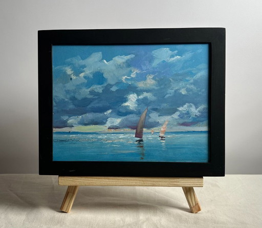 Peinture à l'huile originale, paysage marin d'été. Le soleil derrière les nuages.