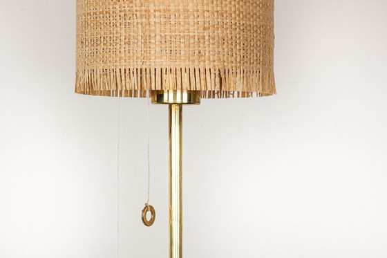 Image 1 of Lampadaire Suédois en Laiton, pied en fonte, modèle G 019 par Bergboms 1960.