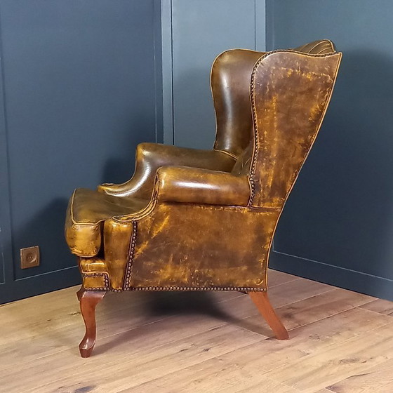 Image 1 of een Set van twee cognac kleurige Vintage chesterfield fauteuils