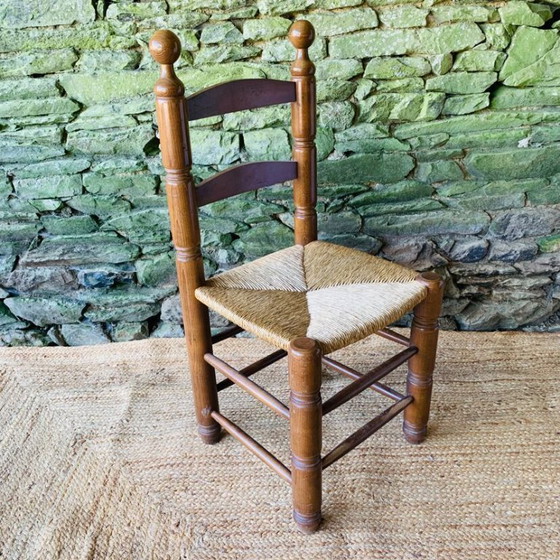 Image 1 of Set van 4 massief houten stoelen met rieten zittingen