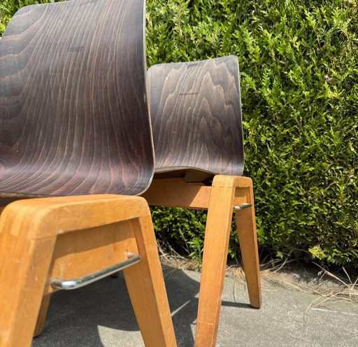 6 stacking chairs by Adam Stegner