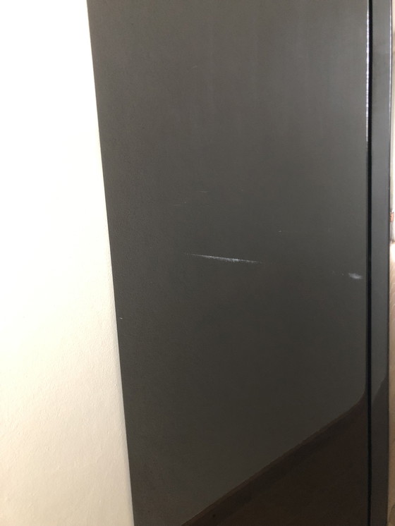 Image 1 of CASSINA nera molto eccedente a 2 ante con ripiani a incastro