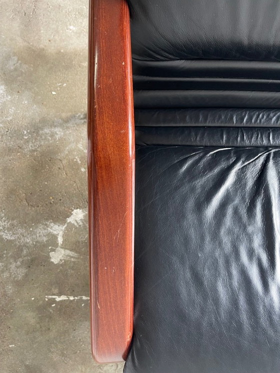 Image 1 of Vintage 2-seater lounge sofa — black leather & solid wood, Italy, 1970s–80s