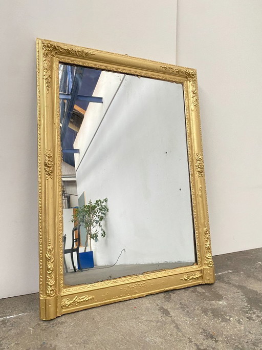 Stuccoed and gilded wooden mirror, 115cm high, 19th century, France