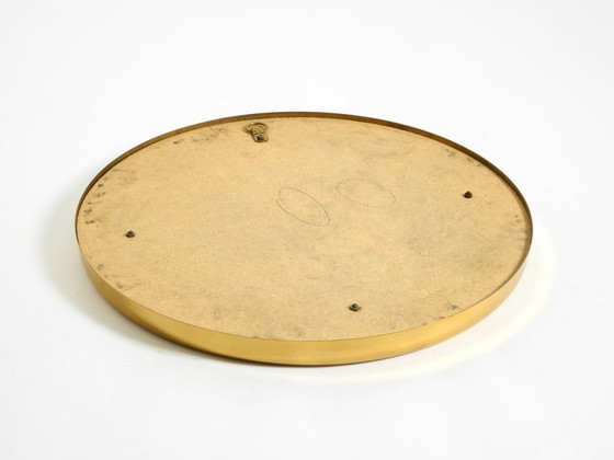 Image 1 of Bellissimo e pesante specchio rotondo in ottone italiano degli anni '60.