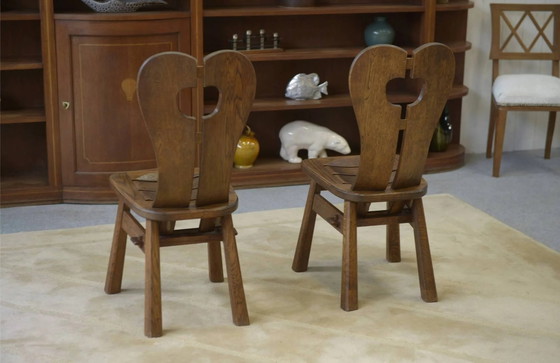 Brutalist pair of chairs by De Puydt in oak, 1960s. – Dining chairs (photo 8 of 9)