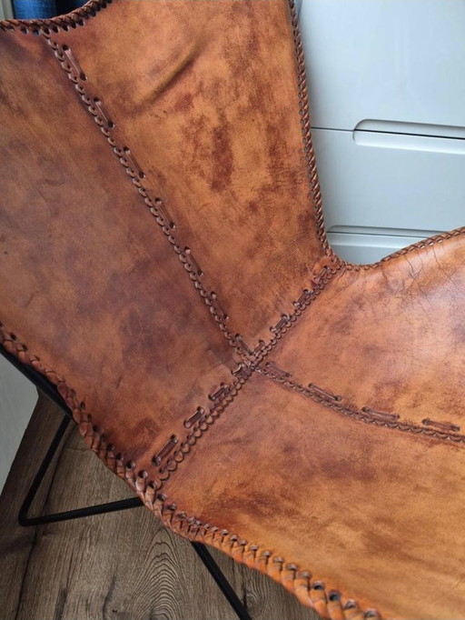 Sedia a farfalla in pelle