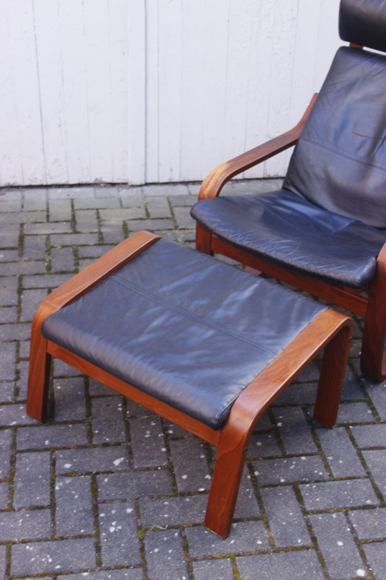 Image 1 of Ikea Vintage - Ikea POÄNG recliner and footstool in black leather, Scandinavian design, 1990s