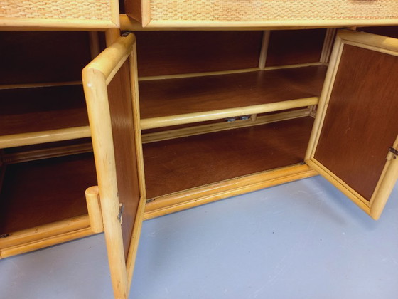 Image 1 of Vintage dressoir/opbergmeubel van rotan en gevlochten rotan uit de jaren 70.